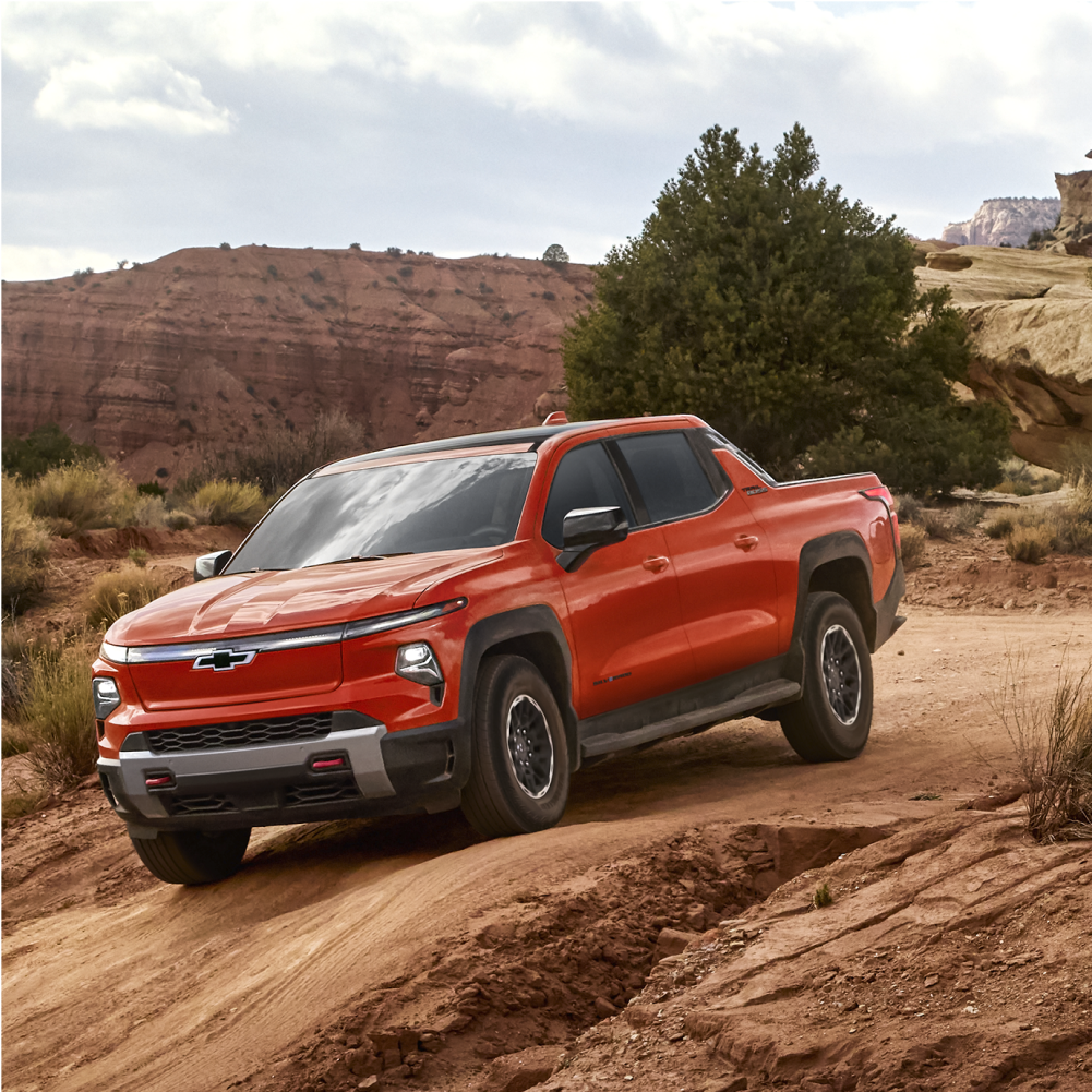 Chevy Silverado EV Trail Boss Off Road Driving Down a Slope