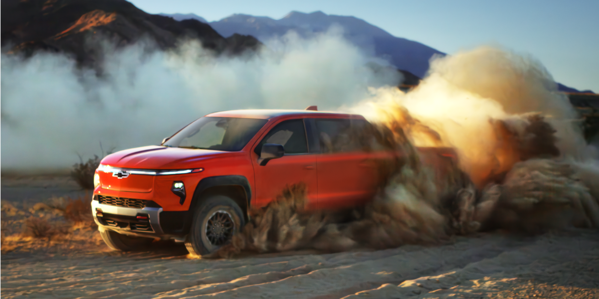 Chevy Silverado EV Trail Boss Speeding on an Off Road Trail and Creating a Dust Cloud