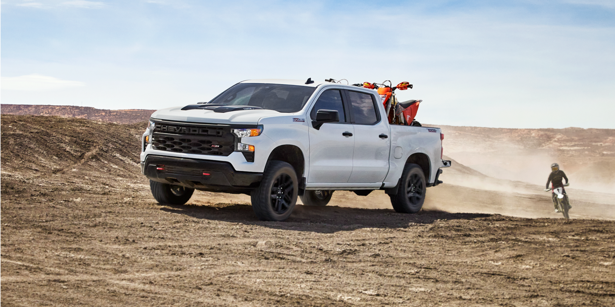 Silverado 1500 Trail Boss With ATV and Dirt Bikes Stored in the Truck Bed