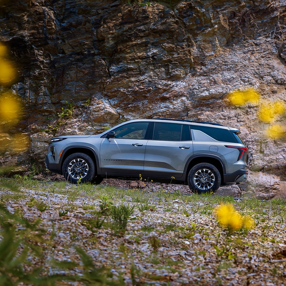 2026 Chevy Traverse Driving Off Road Up Rocky Terrain