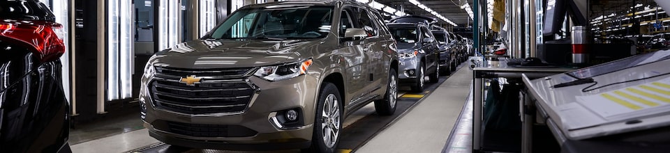 Completed Chevy SUVs on a Factory Conveyor Belt