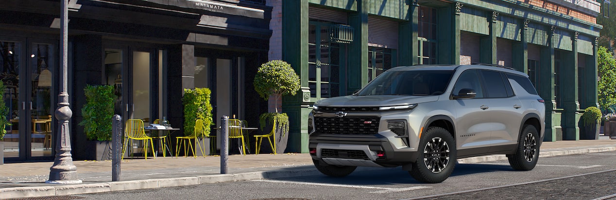 A Chevrolet SUV Drives on a Dirt Road