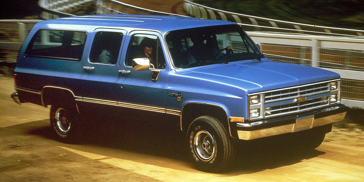 Side Three Quarters View of a 1987 Blue Chevy Suburban
