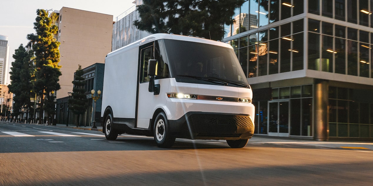 Chevy BrightDrop Electric Van Driving Through a City