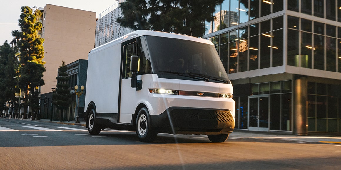 Chevy BrightDrop Electric Van Driving Through a City