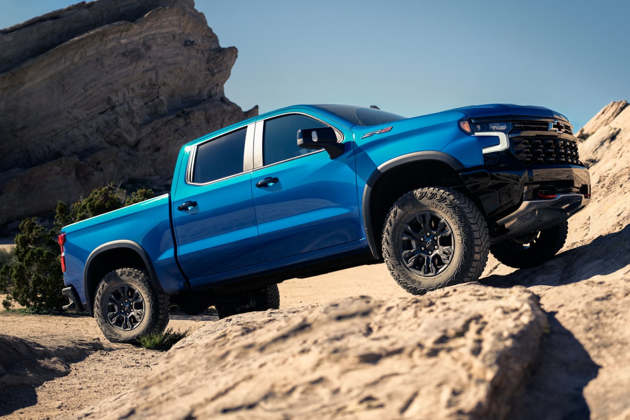 Blue Silverado ZR2 Driving Uphill on Off-Road Terrain