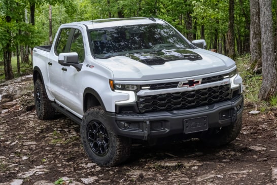 Silverado ZR2 Bison Driving Off-Road in Woods