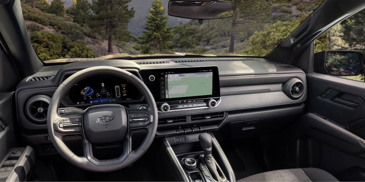 Close-up of the Steering Wheel and Dashboard Monitor of a 2025 Chevy Colorado