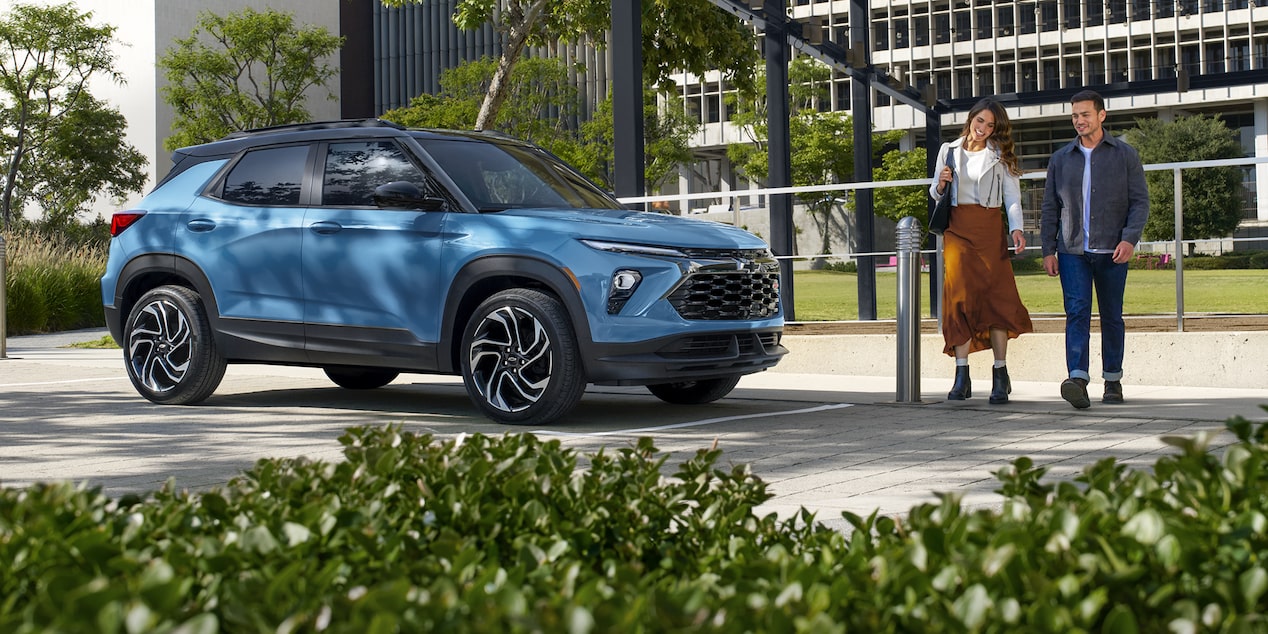 A Couple Walking Up to Their Parked 2026 Chevy Trailblazer