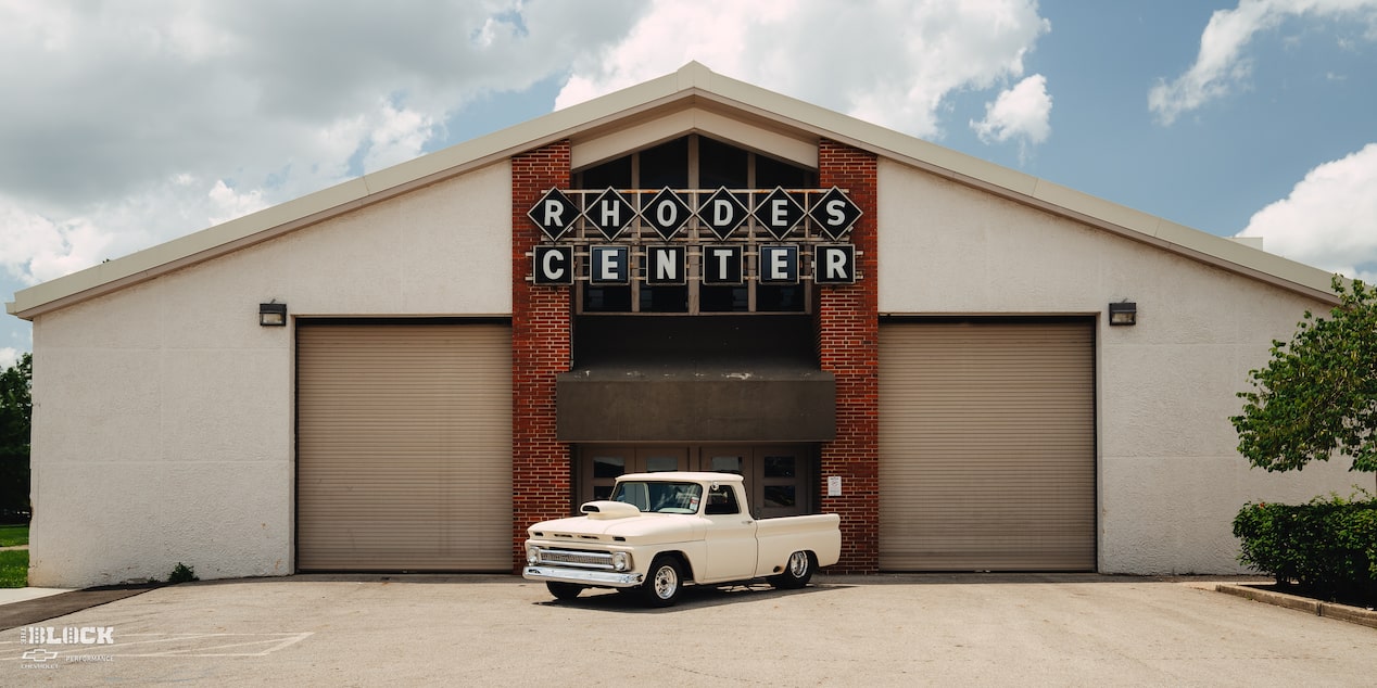 1966 Chevy C10 Custom Truck Parked In Front Of Rhodes Center Building